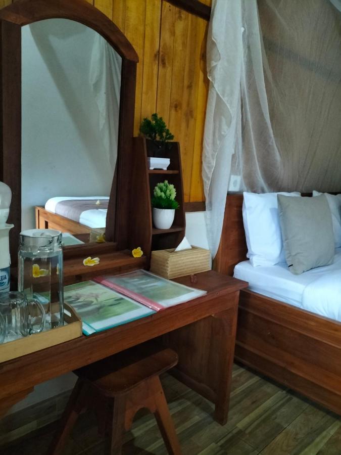 Friendly Homestay Lemukih Singaraja Værelse billede